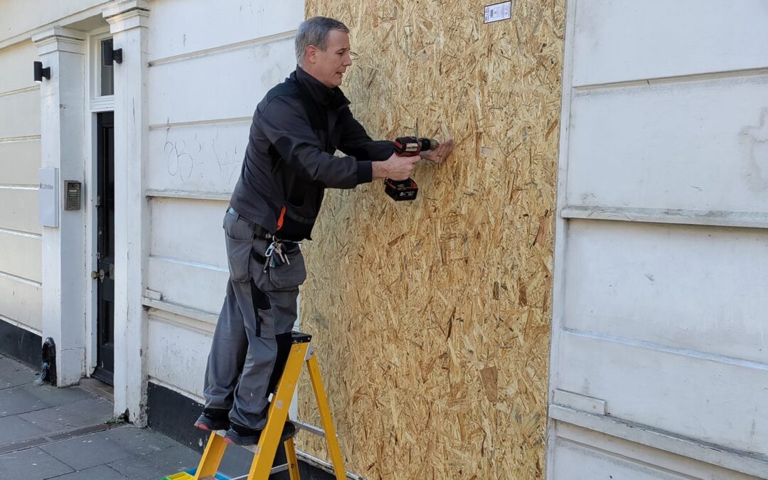 Window Boarding Up of Commercial Shop in Central Brighton