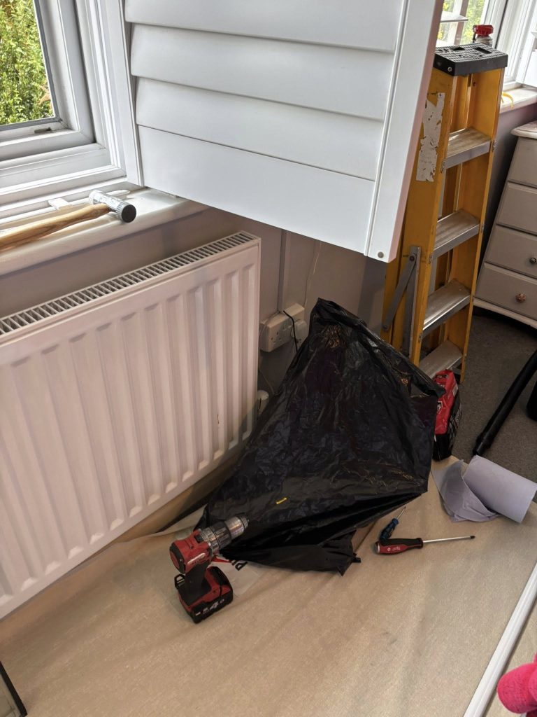 Power tools carefully set on a protective cloth on the floor