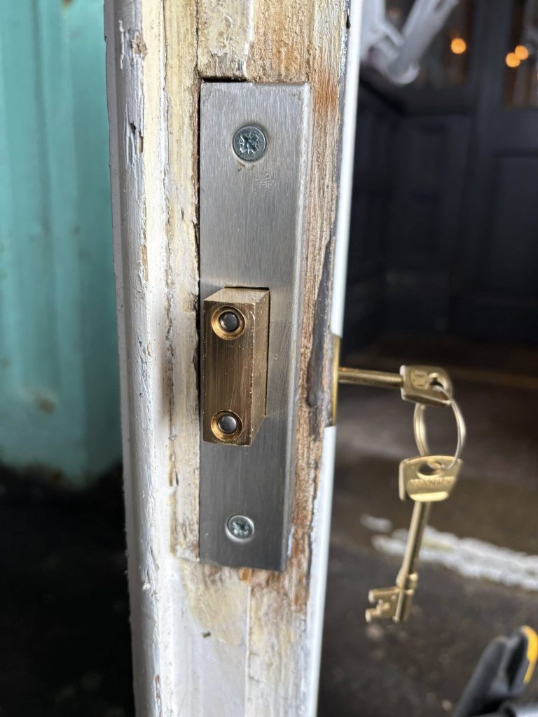 Lock plate and key in the door