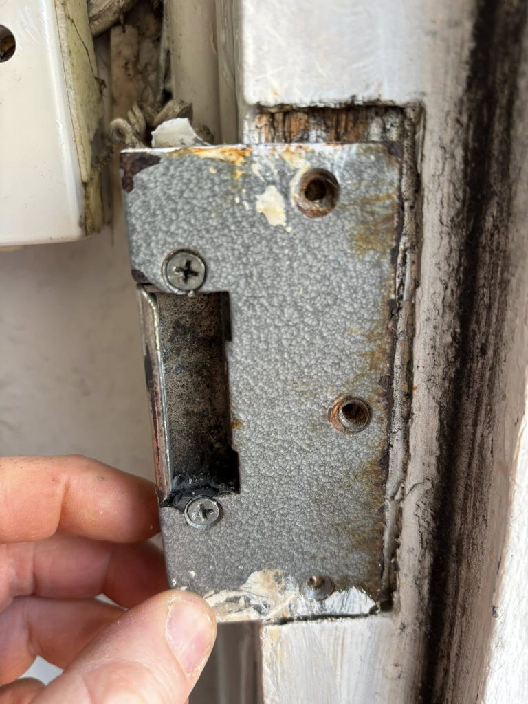 Old door strike plate